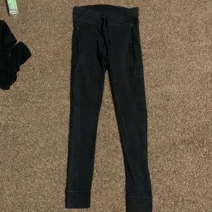 Black Pink/VS leggings, has zip up pockets! Good condition.